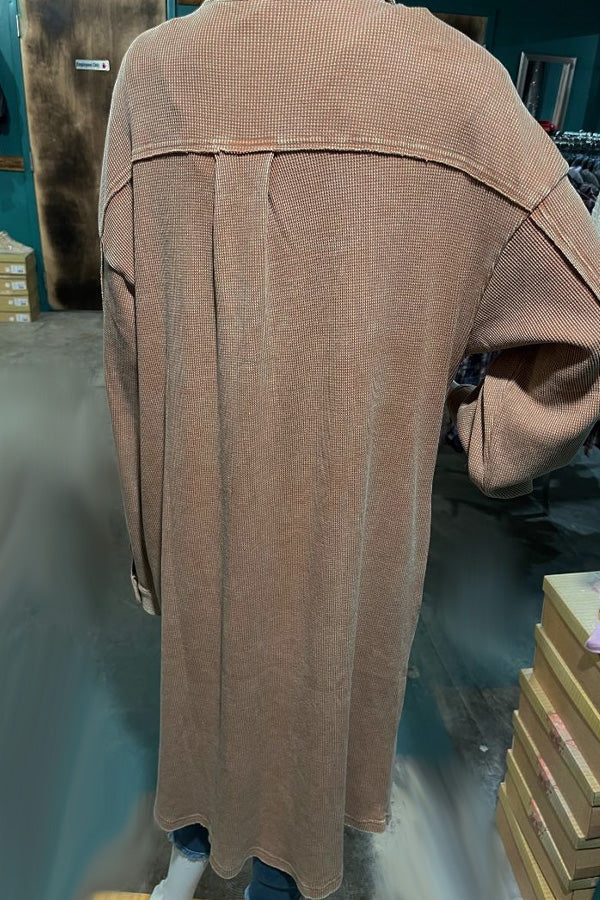 Mineral Wash Thermal Dress This is an instant classic! Gorgeous brown mineral wash fabric, thermal knit, long design that could be a dress or a fabulous cardigan! 60% polyester / 40% cotton, will be your go to this season! Double pockets and nice button accents complete this look. Get one today, they won't last!