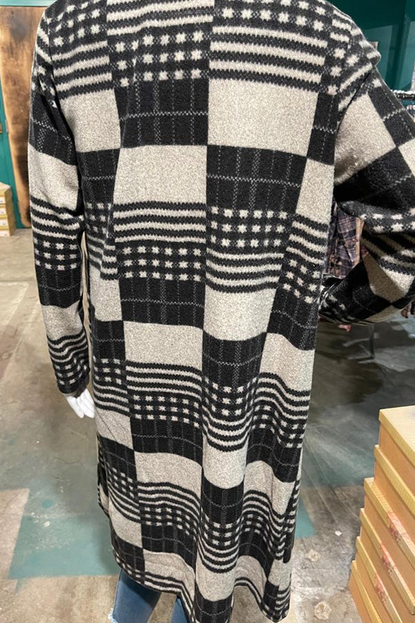 Faux Cashmere Cardigan Simply classic gray and black tone, faux cashmere cardigan, lightweight feel, 97% polyester / 3% spandex. This will become a staple in your closet!