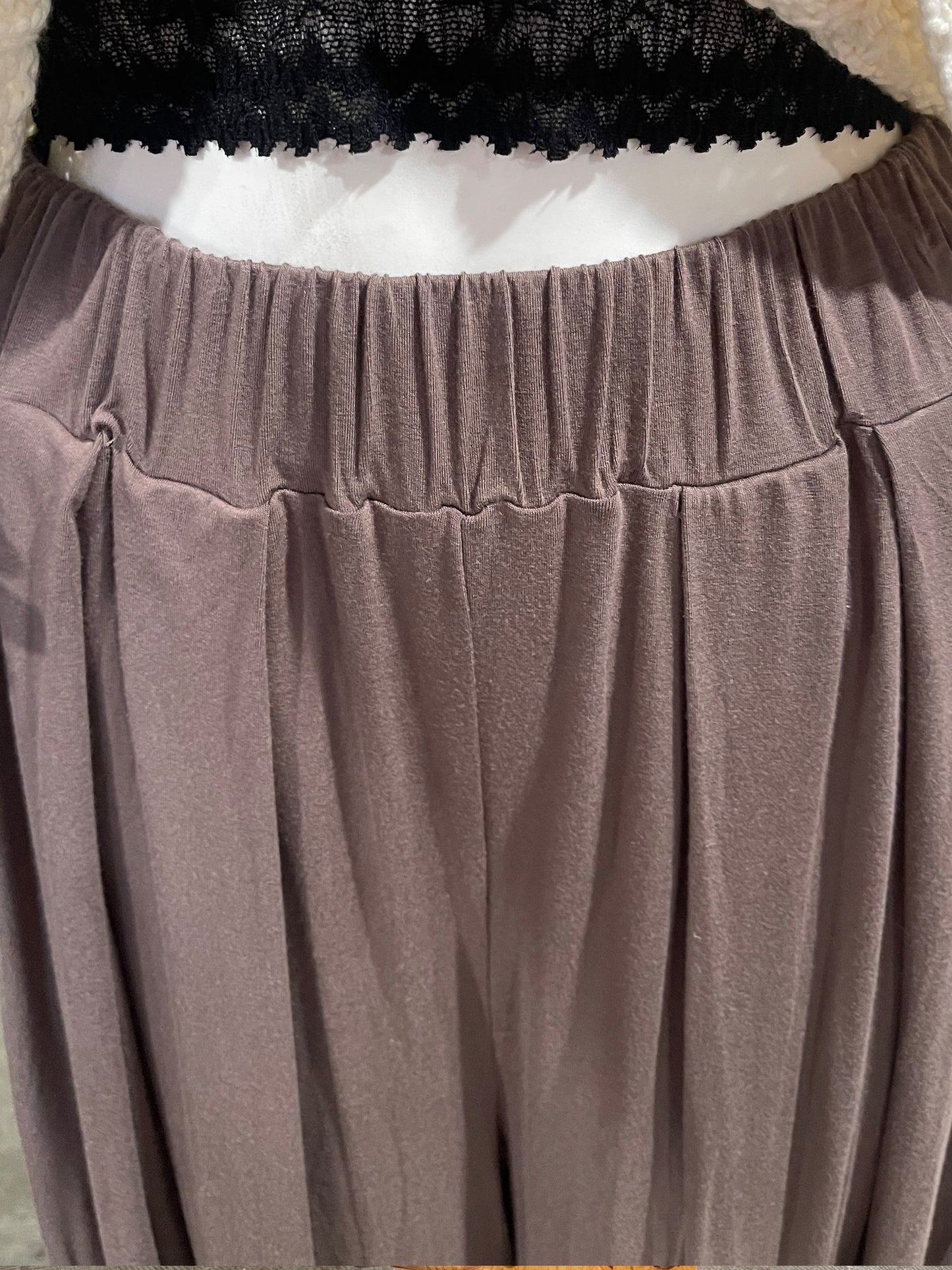 Truly a beautiful and classic look to these simple but stunning draped slacks! Super comfy and easy to wear 95% polyester / 5% spandex, you could literally sleep in them! Elastic waste, super wide leg, see photos. Perfect for all your cream or oatmeal looks or add a dash of color. By Easel.