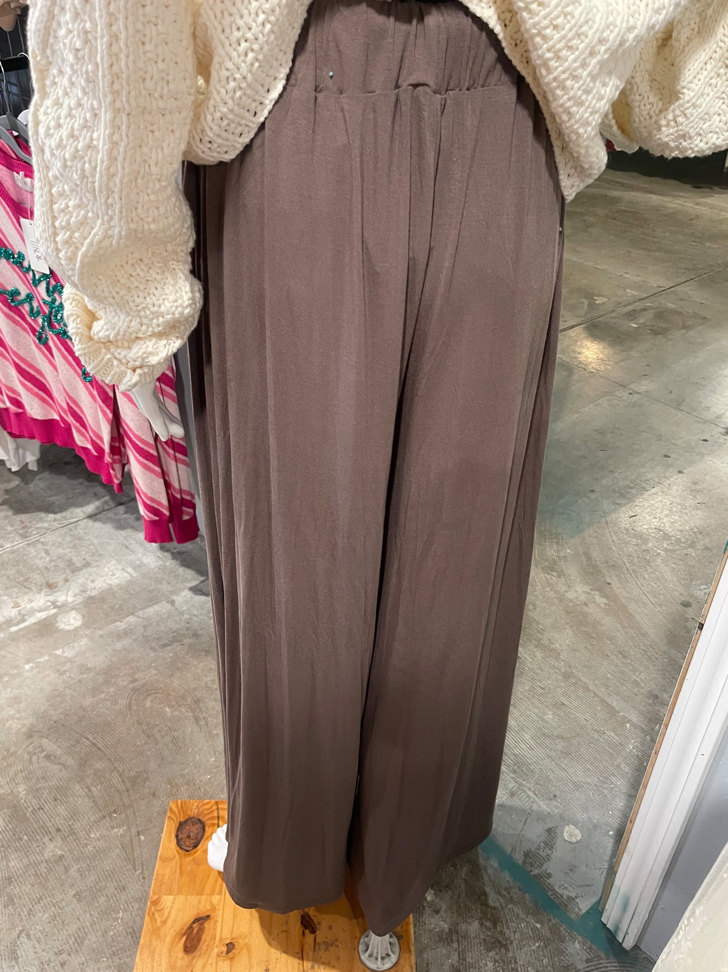 Truly a beautiful and classic look to these simple but stunning draped slacks! Super comfy and easy to wear 95% polyester / 5% spandex, you could literally sleep in them! Elastic waste, super wide leg, see photos. Perfect for all your cream or oatmeal looks or add a dash of color. By Easel.