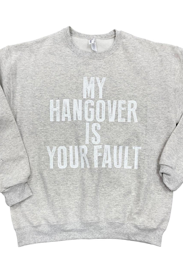 Hangover Your Fault Shown on an oatmeal crewneck, this sweatshirt is perfect to place blame and look stylish in the process. Cotton/poly blend. Unisex relaxed fit.