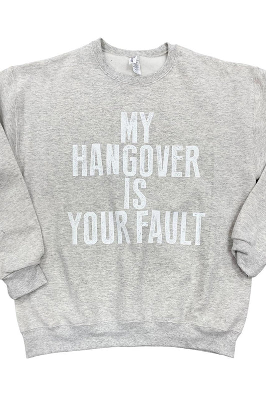 Hangover Your Fault Shown on an oatmeal crewneck, this sweatshirt is perfect to place blame and look stylish in the process. Cotton/poly blend. Unisex relaxed fit. 