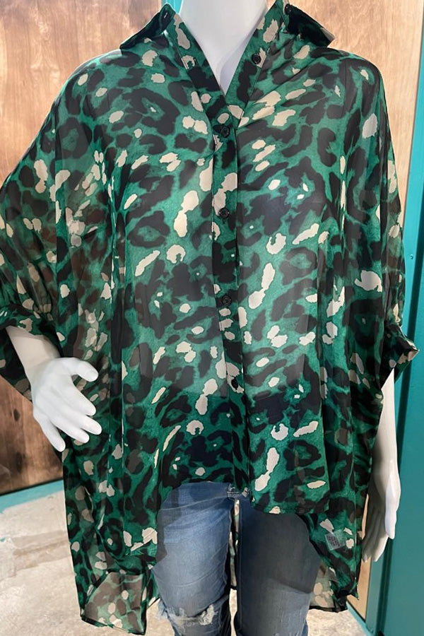 Sheer Animal Print Hi Lo Top Ready to layer? This beautiful green tones top is ready for you! Wear with your favorite bralette, tank or cami, it is so flowy with great roomy 3/4 sleeves! We tried to take a pic of how sheer it is, you can see my fingers through the fabric in the pic. Nice hi/lo shape. 65% polyester, 22% rayon, 13% spandex. Only a handful left, grab yours now!