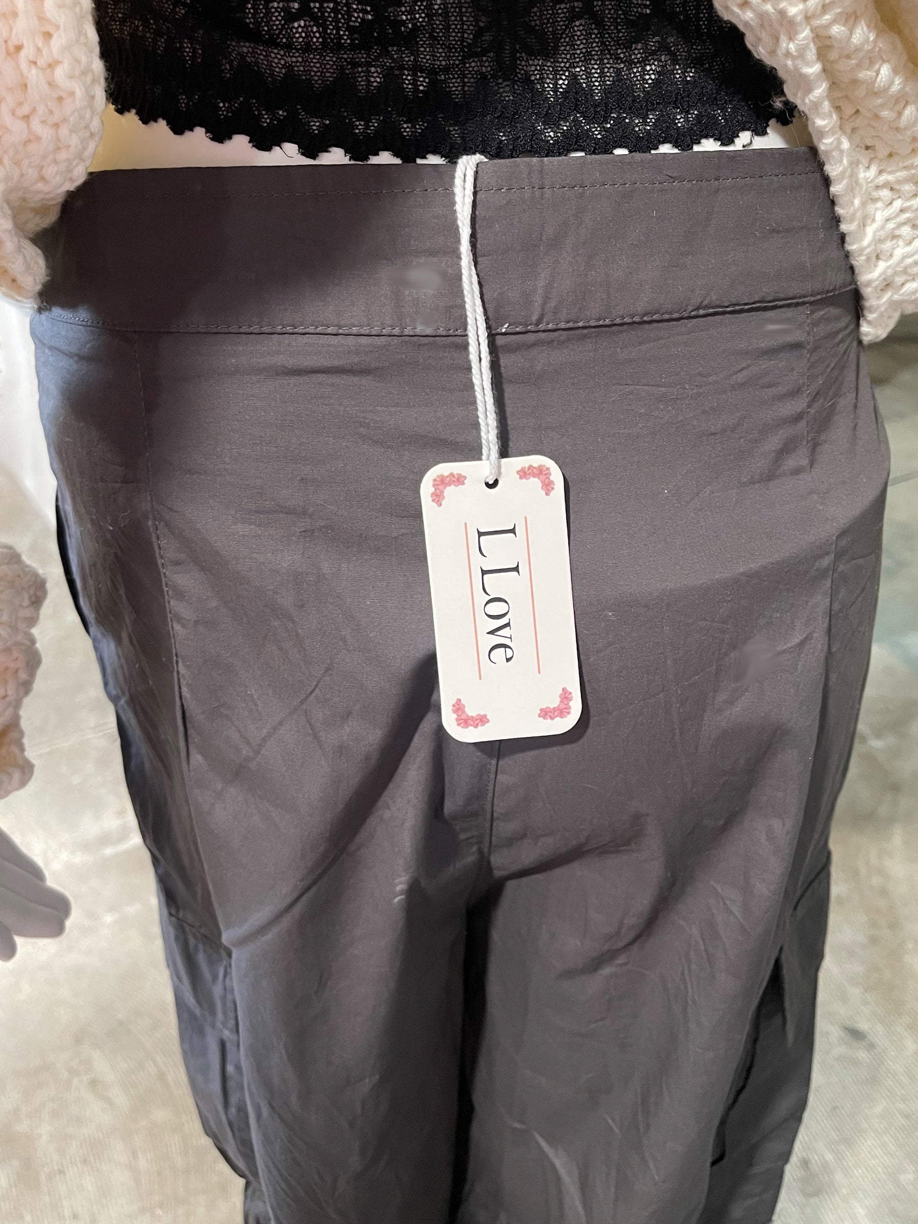 Trendy but so classic, these fantastic cargos are the perfect pairing to practically any top! 100% cotton, they do not have stretch, so keep that in mind when ordering. Bottom leg hems have snaps for a whole new look, or wear them wide. Double drawstrings with trendy hardware.