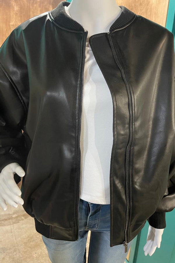 Faux Leather Retro Boyfriend Jacket in Black So cool and trendy! Nothing flatters better than an oversized jacket, and this one doesn't disappoint! Super generous fit with roomy, blousey sleeves, 97% polyester/3% spandex. The color is sexy black, perfect for so many looks. Size down for a more traditional look, or go with the oversized fit and order your regular size.