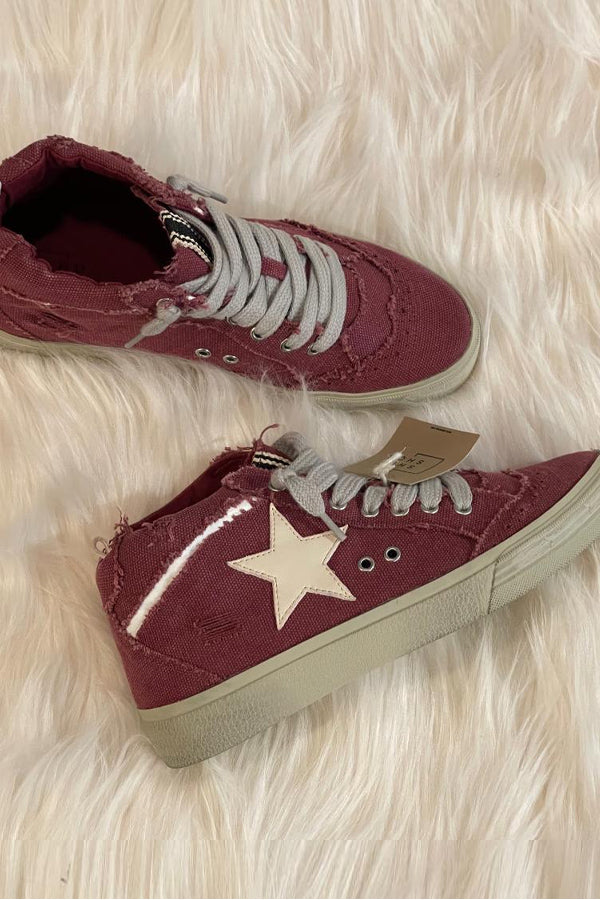 Introducing Paulina! This gorgeous color sold me on this Shu Shop sneaker. Most say they run true, but I sized up a half size because of the mid-top fit of this one. Rich cranberry color, has a cool retro vibe. Grab yours today, these will sell out!