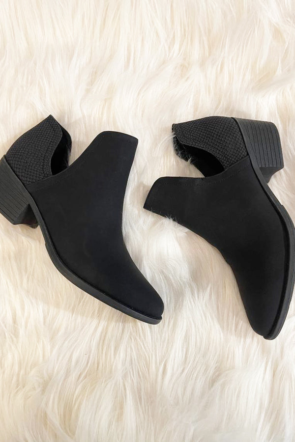 The perfect bootie is here! You will wear these Very Volatile Chronicle faux suede booties with almost everything. Sweet black faux suede with a textured heel, deep set on the sides for style that is easy off and on. grab this closet staple today!