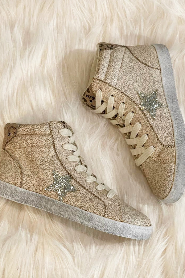 HOT sneaker by Very G! Introducing "Sammi"... don't let her taupe colors fool you... she is all about getting attention! True to size, but size up a half if you are in the high end of your size. This hi-top cutie won't last, so get yours today!