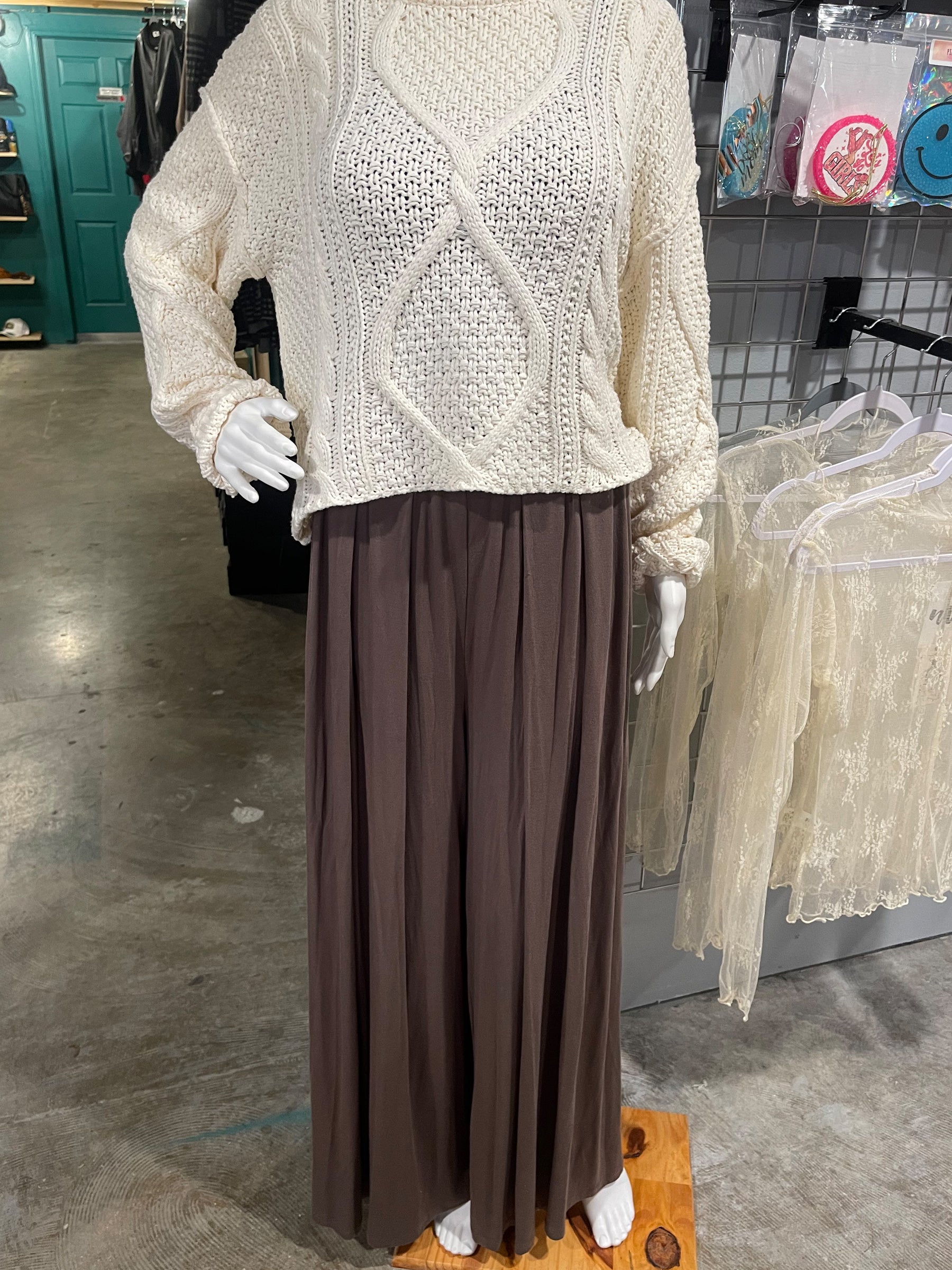Truly a beautiful and classic look to these simple but stunning draped slacks! Super comfy and easy to wear 95% polyester / 5% spandex, you could literally sleep in them! Elastic waste, super wide leg, see photos. Perfect for all your cream or oatmeal looks or add a dash of color. By Easel.