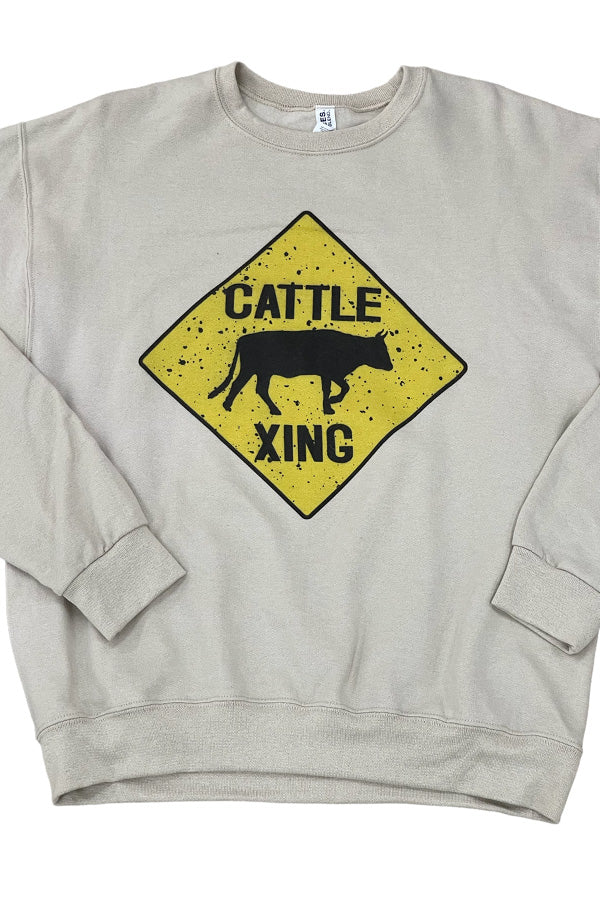 Cattle Crossing Shown on a khaki or oatmeal crewneck, this sweatshirt is super cool for everyday wear. Cotton/poly blend, great with leggings, jeans or wear oversized with shorts. Unisex relaxed fit. 