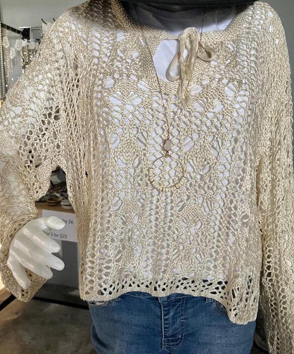 Crochet Boho Style Layering Top Romance-inspired, boho roots, this gorgeous cream crochet top, perfect to layer over your favorite tank or tee. Wear all spring and summer long, shorts, wide leg pants, denim... pretty much anything you pair it with. True to size, by Kori, slight cropped length. Get this one before it sells out!