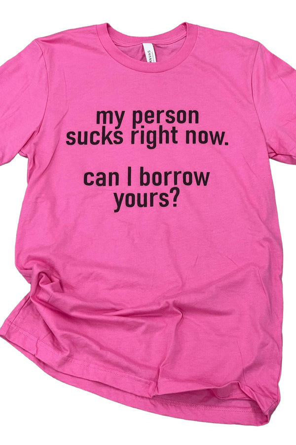 My Person Sucks Right Now Can I Borrow Yours? Shown on charity pink, this tee is kinda sorta true. Bella Canvas ringspun cotton soft tee. Unisex relaxed fit. 