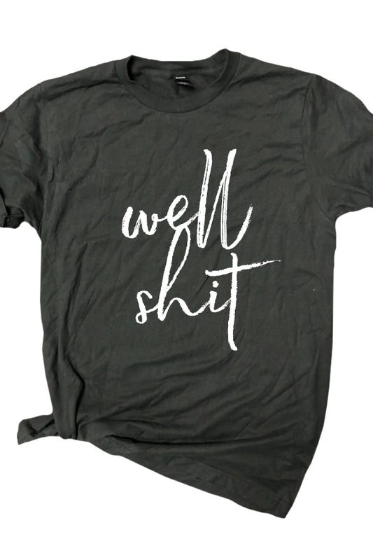 Well shit Shown on heather graphite, speaks to everyone. Ringspun cotton/poly soft tee. Unisex relaxed fit.