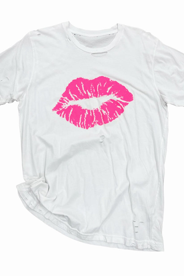 Hot Pink Kiss Destroyed Tee Shown on the fabulous super soft destroyed tee, a boxier fit with all the rips and cuts, not too many, just right! Combed ringspun cotton, you could sleep in this one. Unisex relaxed fit. 