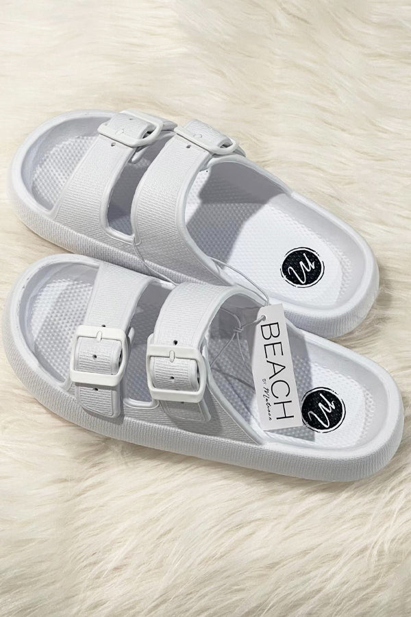 You will love how comfy these stylish slides are, from the Beach by Matisse collection, white color. True to size, no half sizes, so go up to the next whole number size. Lightweight, vegan cushioned, Beach by Matisse is a lifestyle.